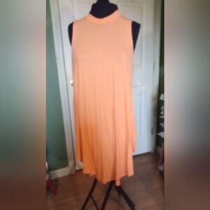 Women's orange sleeveless shirt, size XL